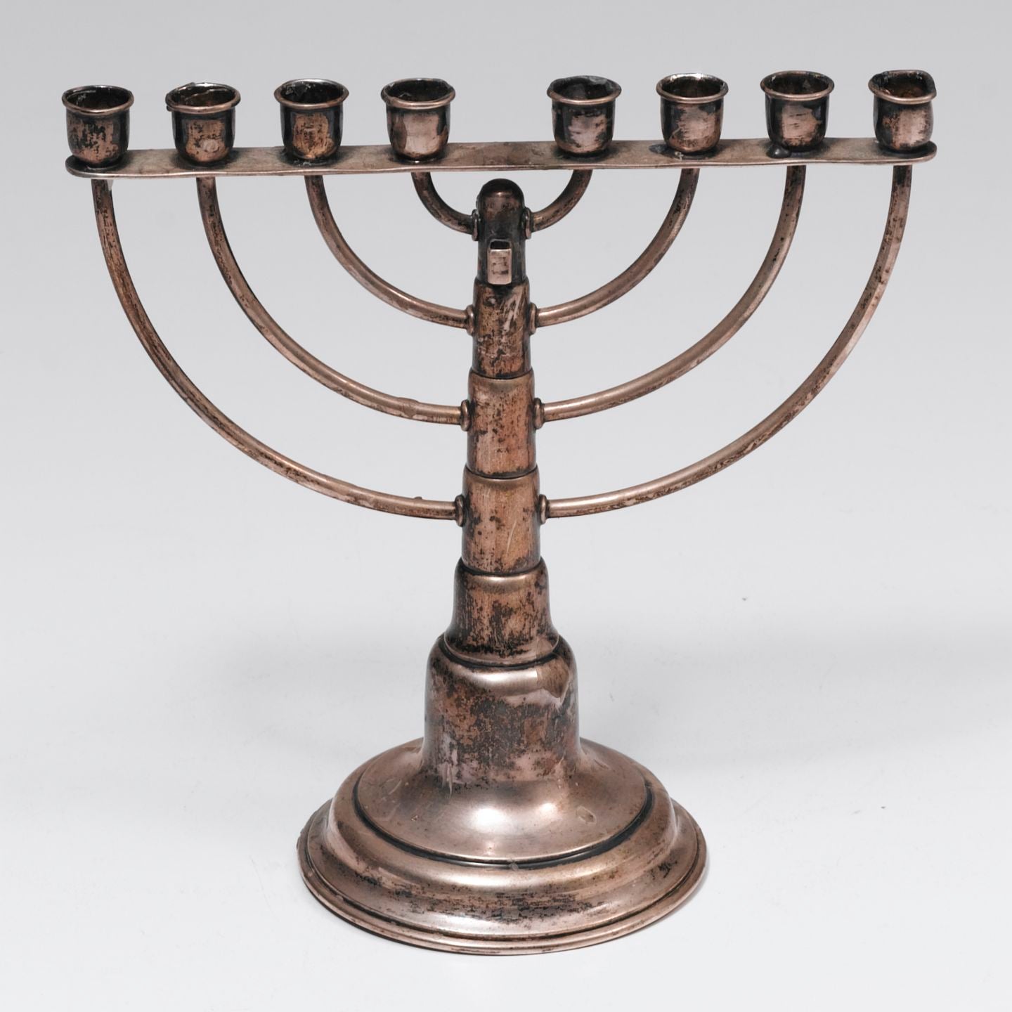 Sterling silver menorah restoration.