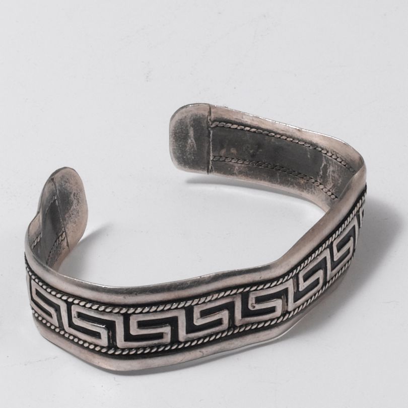 Silver jewelry repair before.