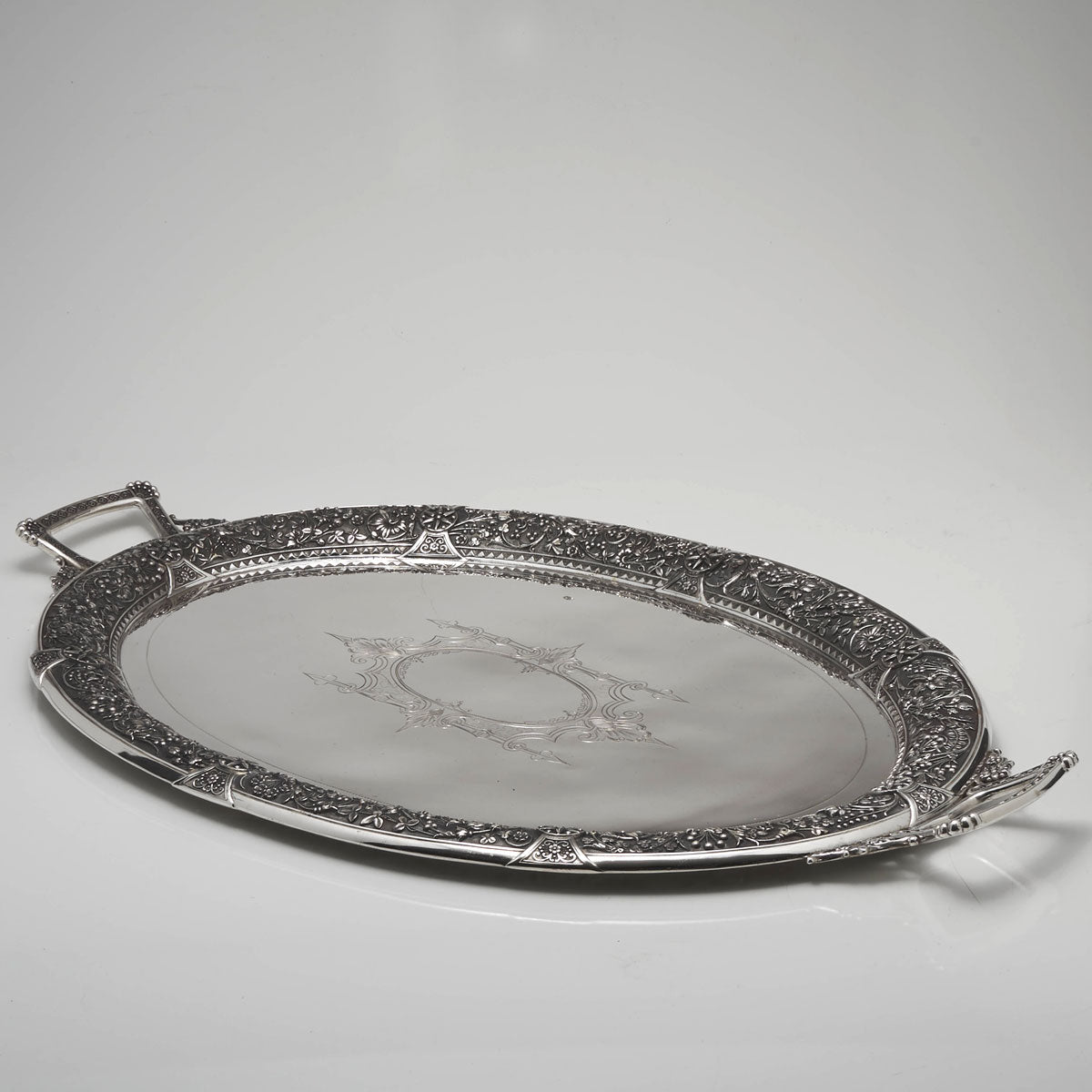 A Mid Century Quality Stainless Steel Serving Tray With Patterned Handles A Mid Century Quality Stainless Steel Serving Tray With Patterned Handles