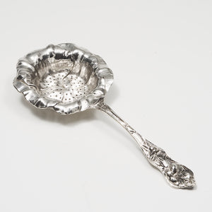 Silver tea strainer