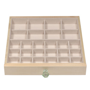 Top drawer features eight 2 ½ x 2 ½ jewelry compartments.