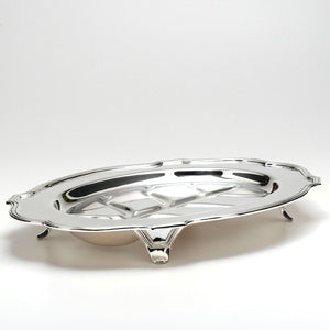 Silver plated well and tree footed carving tray.